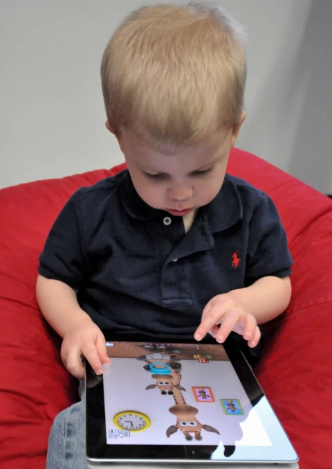 Kid Using Tablet.
